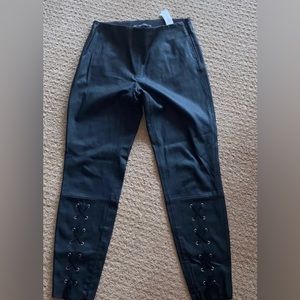 ZARA—-Black Faux Leather Leggings with Lace up at bottom front.